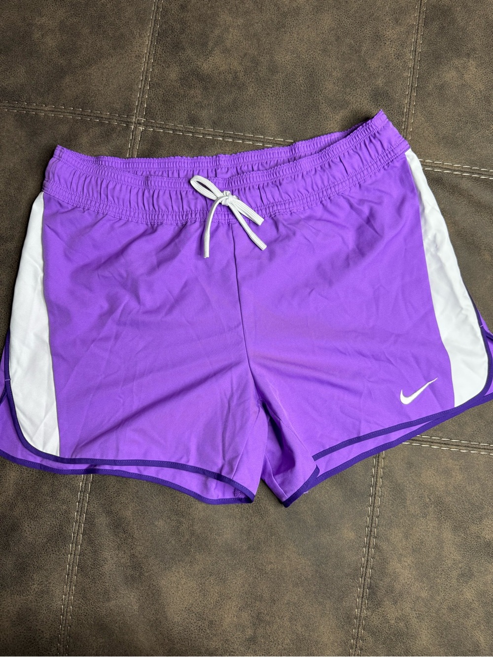 Nike Women's Purple Athletic Shorts with White Side Panels and Drawstring